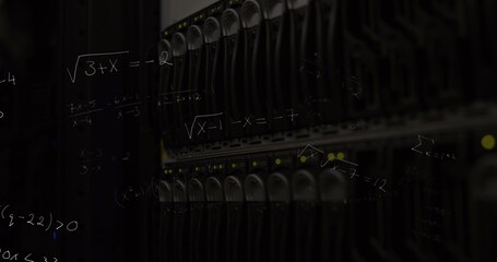 Image of mathematical formulae floating over data machine