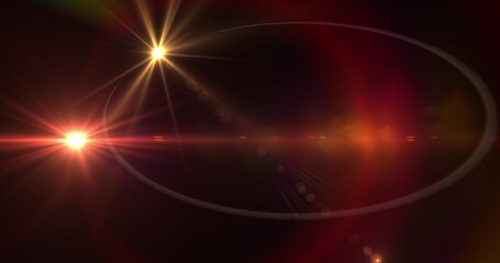 Three spots of light against black background