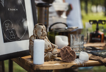 stand with a small statuette