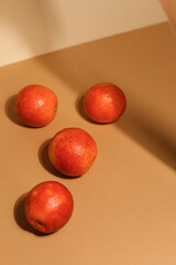 Juicy dark tangerines on light background. Tasty fruits. Focus on front tangerine Selective focus