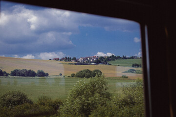 landscape with field and village