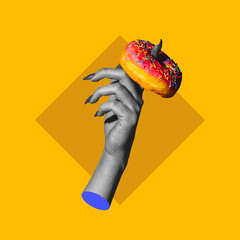 Contemporary modern art collage in pop-art style. Hand with glaze donut isolated on purple background with copyspace for ad, contrast