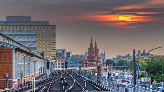 Berlin germany skyline aerial view time lapse at sunset bridge tram in 4k.