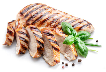 Grilled chicken fillet with herbs isolated on white background.