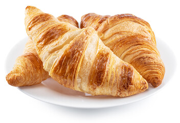 Tasty crusty croissants on the plate on white background. File contains clipping path.