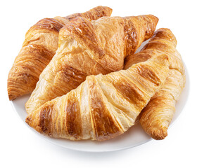 Tasty crusty croissants on the plate on white background. File contains clipping path.