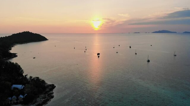Aerial view of Sunset over horizon in tropical sea at lipe island