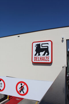 AALST, BELGIUM, 25 AUGUST 2021: Exterior view of the newly built Delhaize Supermarket in Aalst. The Delhaize Group is a Belgian Supermarket chain with stores worldwide. Copy space above.