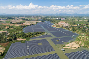 Aerial photo of photovoltaic solar power panels on the water