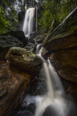 waterfall through the rocks in brisbane water national park