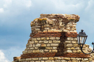 Old fortress walls are destroyed by time, ruins of a sea fortress