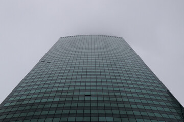 Fototapeta na wymiar Skyscraper in fog
