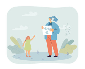 Female teacher showing puzzle to little girl. Child playing game with woman in kindergarten flat vector illustration. Education, childhood concept for banner, website design or landing web page