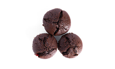 Chocolate cupcakes with cherry jam isolated on a white background. Chocolate muffin.