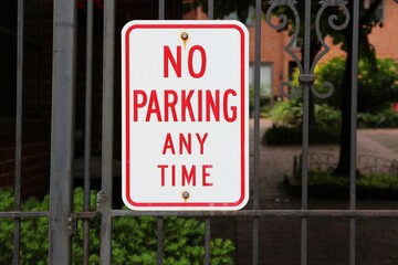No parking sign on a gate