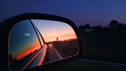 Sunset on the mirror at Padana plain near the Po river, Italy