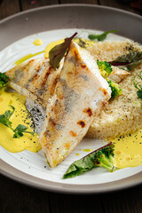 Gourmet pike perch fillet with couscous and bearnaise sauce