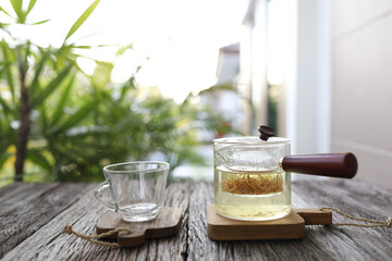 lotus pollen tea in clear glass cup