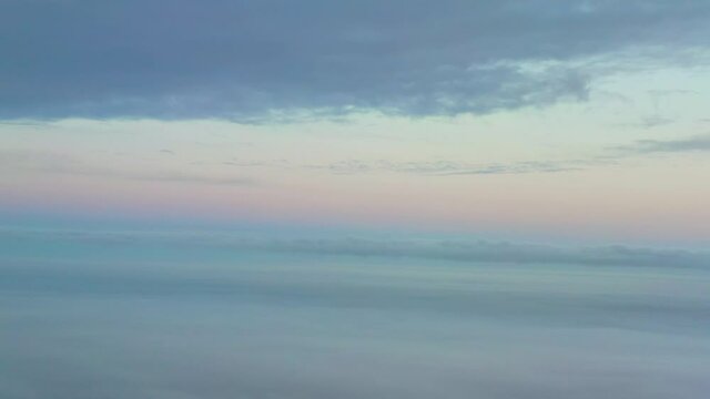 The sky above the clouds before dawn. Wonderful heavenly landscape.
