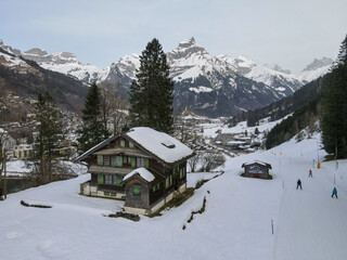 Winter landscape view at a chalet over Engelberg in the Swiss alps
