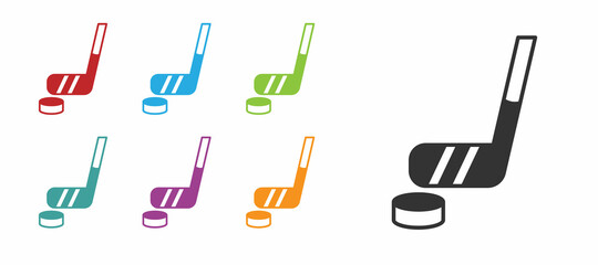 Black Ice hockey stick and puck icon isolated on white background. Set icons colorful. Vector