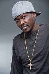 Young man offers a variety of poses and attitudes during a studio photo session