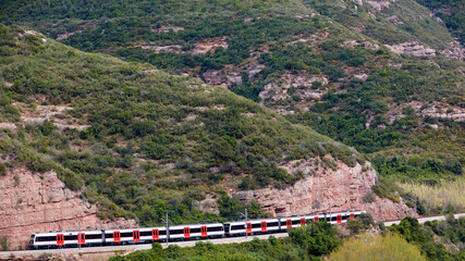 The train in mountain near Santa Maria de Montserrat Abbey.
