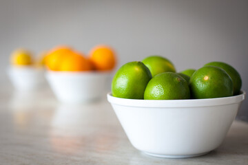 Still life of limes, lemons, fruit