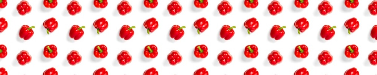 Bulgarian red ripe pepper on white backdrop. background from paprika, flat lay not seamless pattern