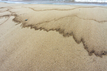 Sea sand. Sandy background. Sandy texture. Natural sea sand and river sand.