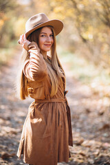 Young woman in an autumn park