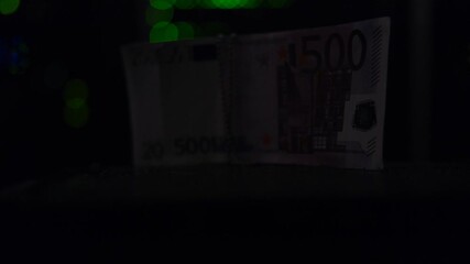 Money in euro on the background of computer equipment in a server room - Powered by Adobe