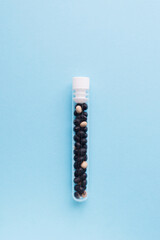 Soy is an exemplary material in a test tube. Soybeans.