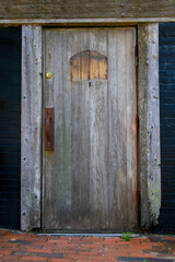 Old wooden door on the front of a hous