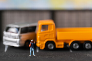 Miniature people Insurance Broker officer take photo car accident in public road using for Car Automotive maintenance repair fixed or replacement Service or Vehicle Insurance guarantee or drive safety