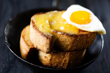 rustic french cheese toast with egg croque madame
