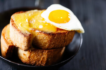 rustic french cheese toast with egg croque madame