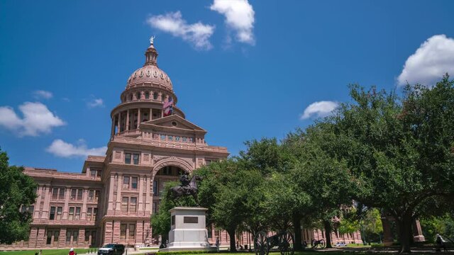 2021 Aug - Day Time Time Lapse of White Clouds Over the Texas State Capitol Dome Statue and Flag