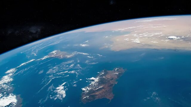 Mediterranean sea Italy islands and Africa coastline view from satellite, earth rotation with dark starry sky in background. Images furnished by Nasa