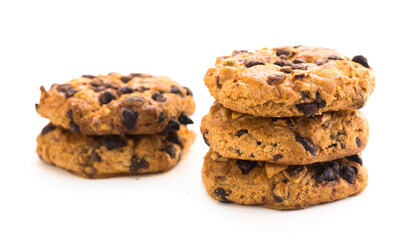 cookies with chocolate and hazelnuts on a white background