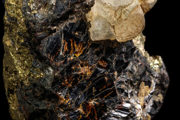 Macro of a mineral stone Sphalerite with fluorite and pyrite on a black background close up