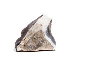 Macro mineral stone Flint in the rock on a white background