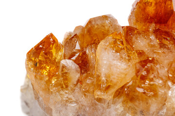 Macro mineral stone Citrine in rock in crystals on a white background