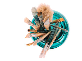 Various professional paint brushes in the green glass jar, isolated on white background - Powered by Adobe
