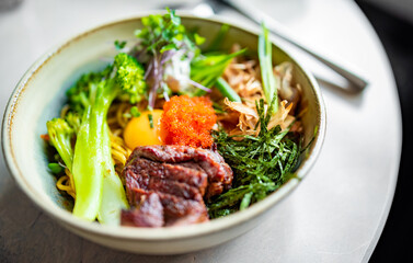 No Broth Mazemen Ramen with beef and Vegetables and caviar in bowl