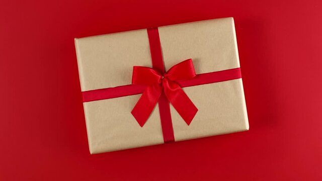 Chrsitmas gift on red background and free space for your decoration. 