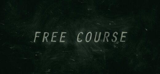 Green chalkboard background with words ‘Free course’ handwritten in white chalk.