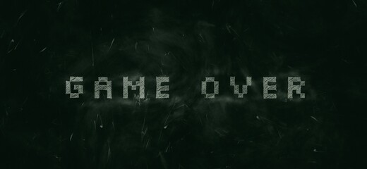 Green chalkboard background with words ‘Game over’ handwritten in white chalk.