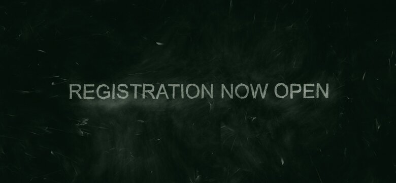 Green chalkboard background with words ‘Registration now open’ handwritten in white chalk.