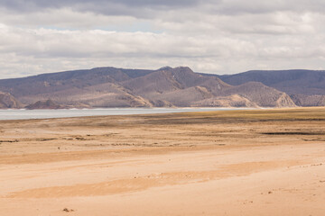 A sandy beach on the bank of the Yenisei River.Russia, Republic of Khakassia